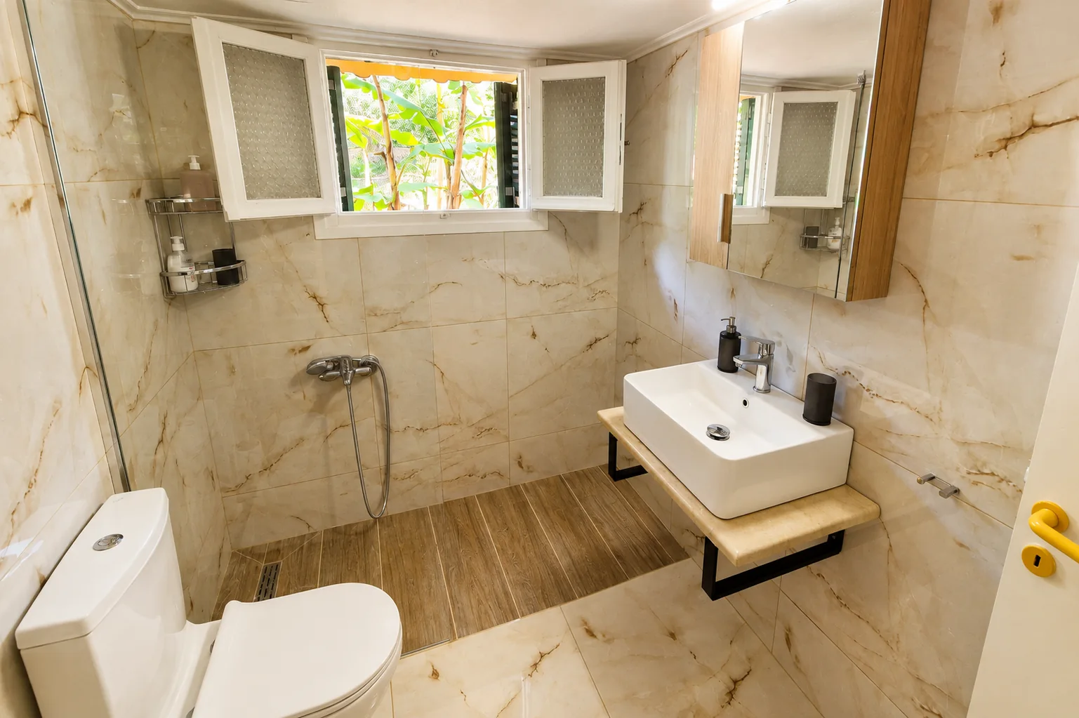 Bright bathroom with shower and natural light at La Terrazza, Villa Vanda