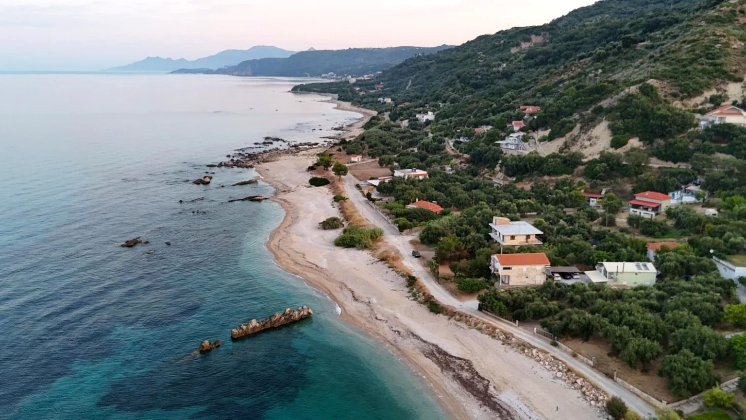 Aerial view of the coastline and beach near Villa Vanda in Lygia, Preveza